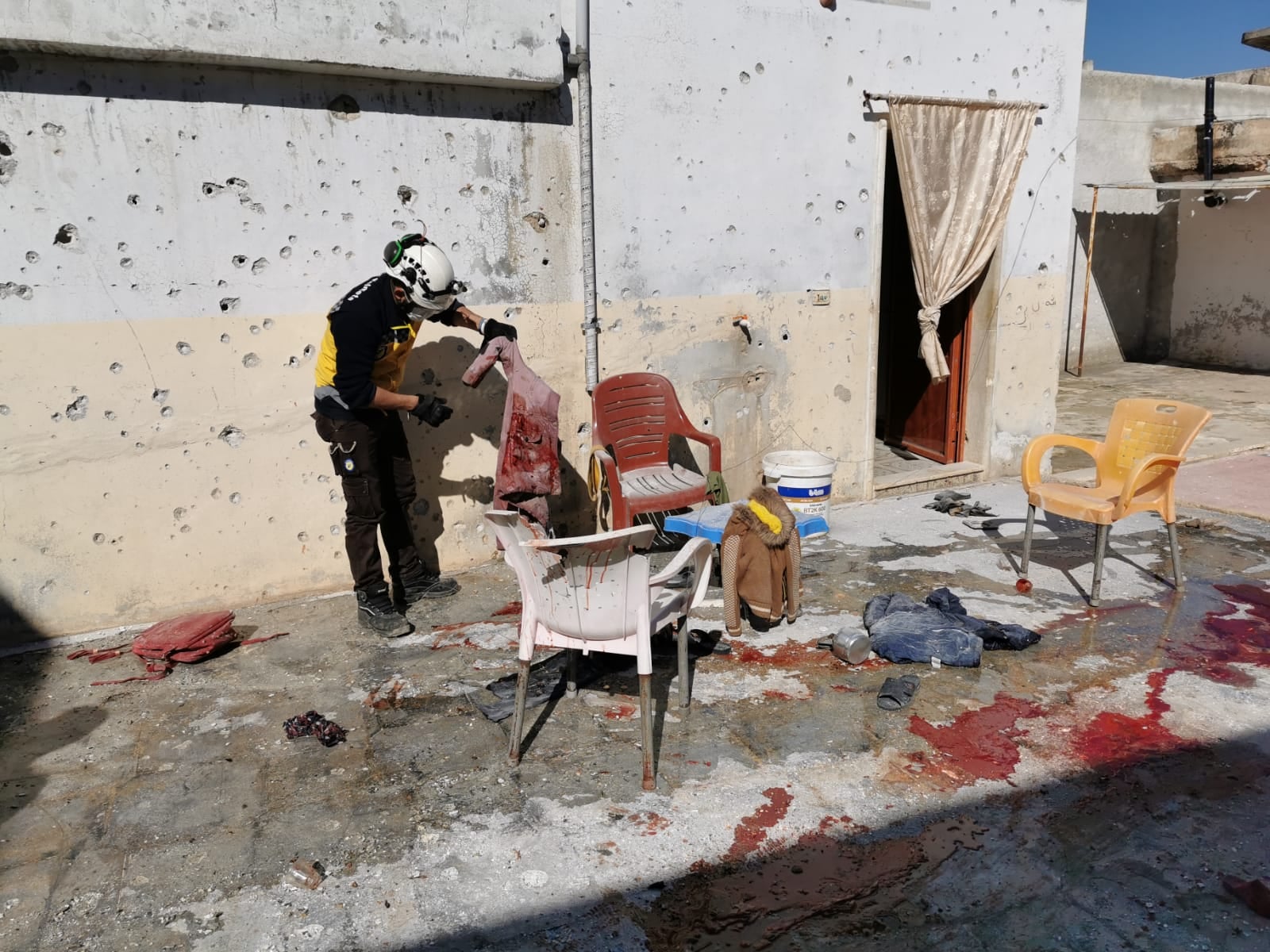 blood stains and damages at the site of massacre in Idlib in Syria 12-2-2022