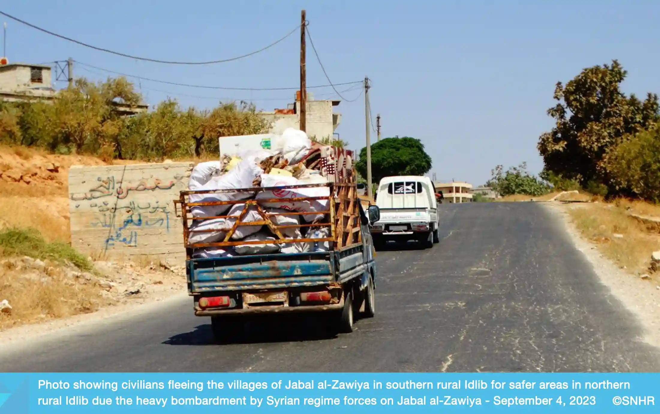Civilians flee villages and towns in rural Idlib to escape intensified bombardment by Syrian regime forces, September 4, 2023
