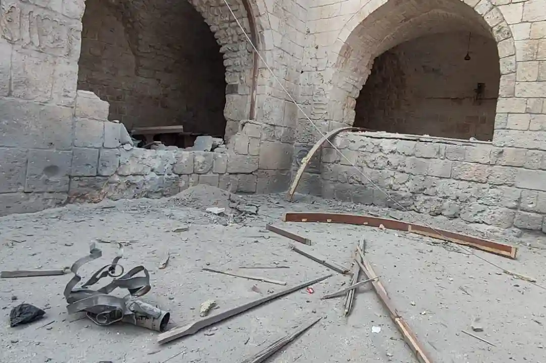 Syrian regime forces bombard the Old Mosque in Sarmin city in eastern Idlib governorate, October 4, 2023
