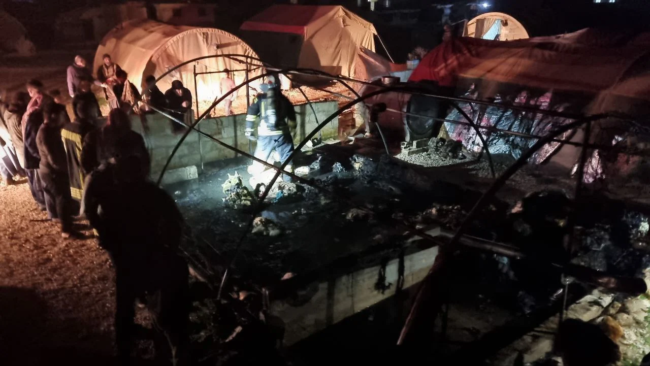 Man and his wife injured in a fire in Basqala IDPs camp in N. Idlib, January 14, 2024