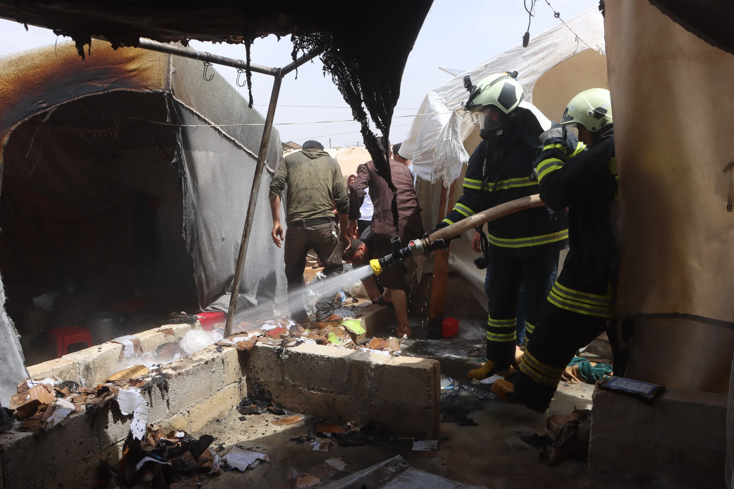 Man injured in a fire in al-Manara Camp for the Displaced in N. Idlib, May 27, 2024